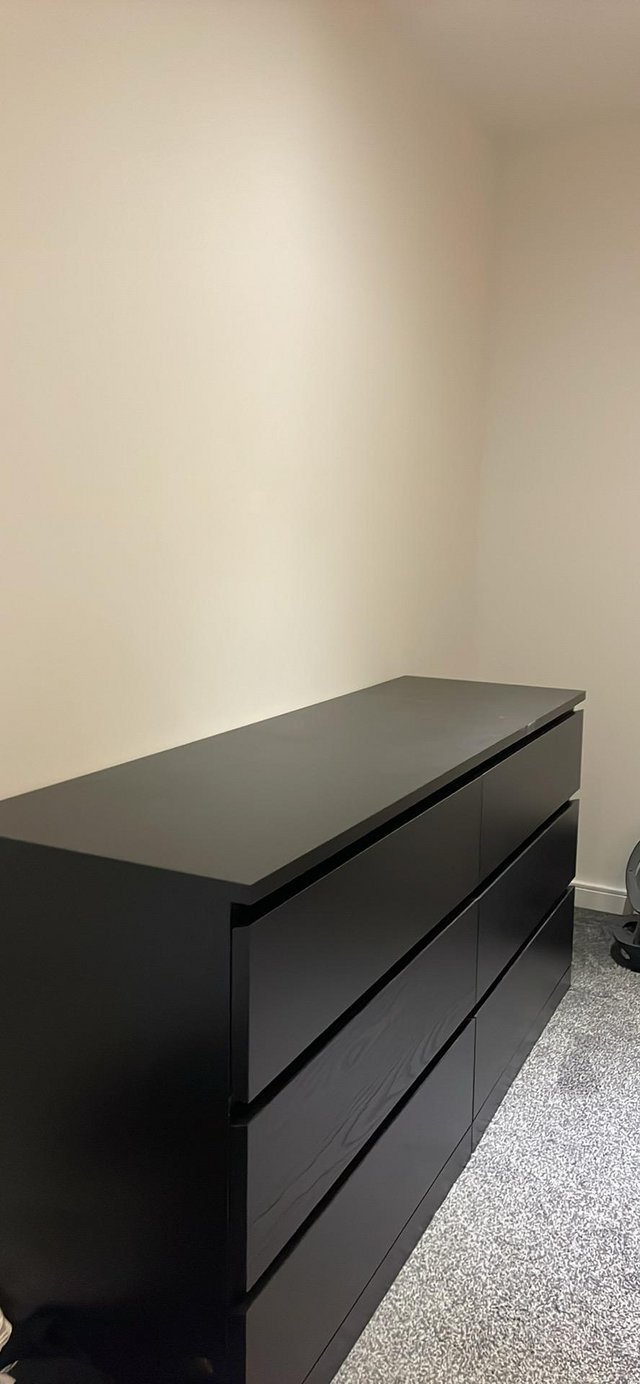 Preview of the first image of IKEA chest of 6 drawers black. 2 years old.