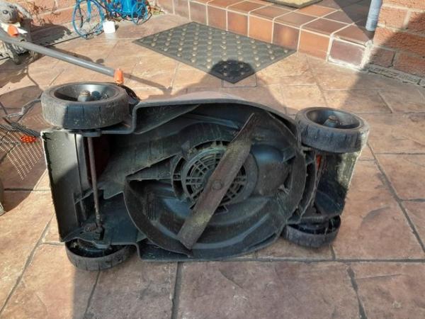 Image 3 of Flymo lawn mower sun damaged but good working condition