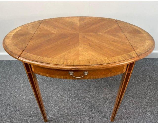 Preview of the first image of John Lewis antique style extending dining table.