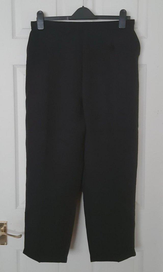 Preview of the first image of Smart Ladies Black Pull On Trousers - Size 22     B9.
