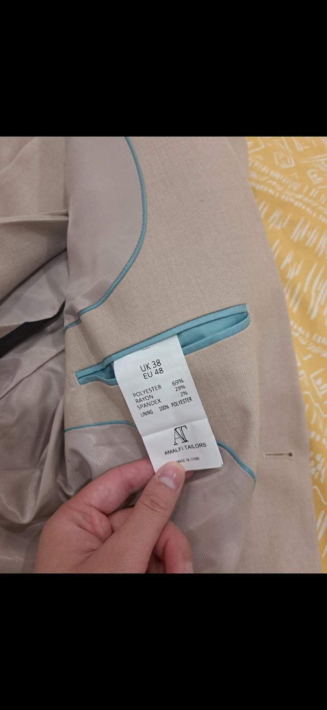 Preview of the first image of 2 x Mens suits in beige size medium and large.