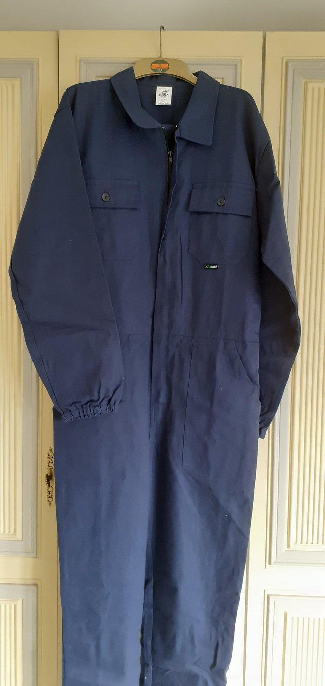 Preview of the first image of Mens brand new navy blue overalls.