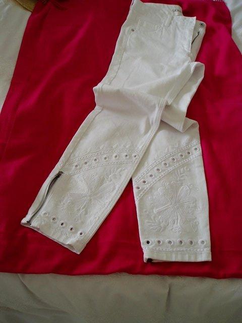 Preview of the first image of White Next stretch skinny trousers size 10 with ankle zip.