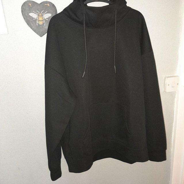 Preview of the first image of Masked hoodie  "ninja style" Black new with tags.