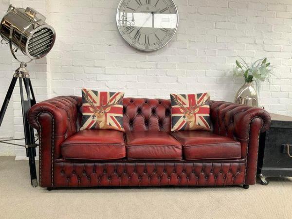 Image 1 of Oxblood SAXON 3 seater Chesterfield sofa. 2 seater availabl.