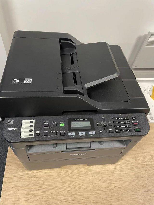 Preview of the first image of BROTHER MFCL2710DW All-in-One Wireless Laser Printer.