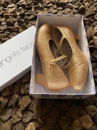 Image 1 of Gold shoes size 4 - Angel’s face