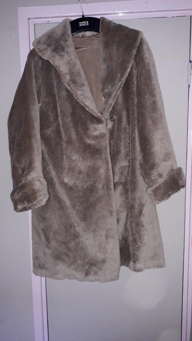 Preview of the first image of Vintage imitation fur coat.