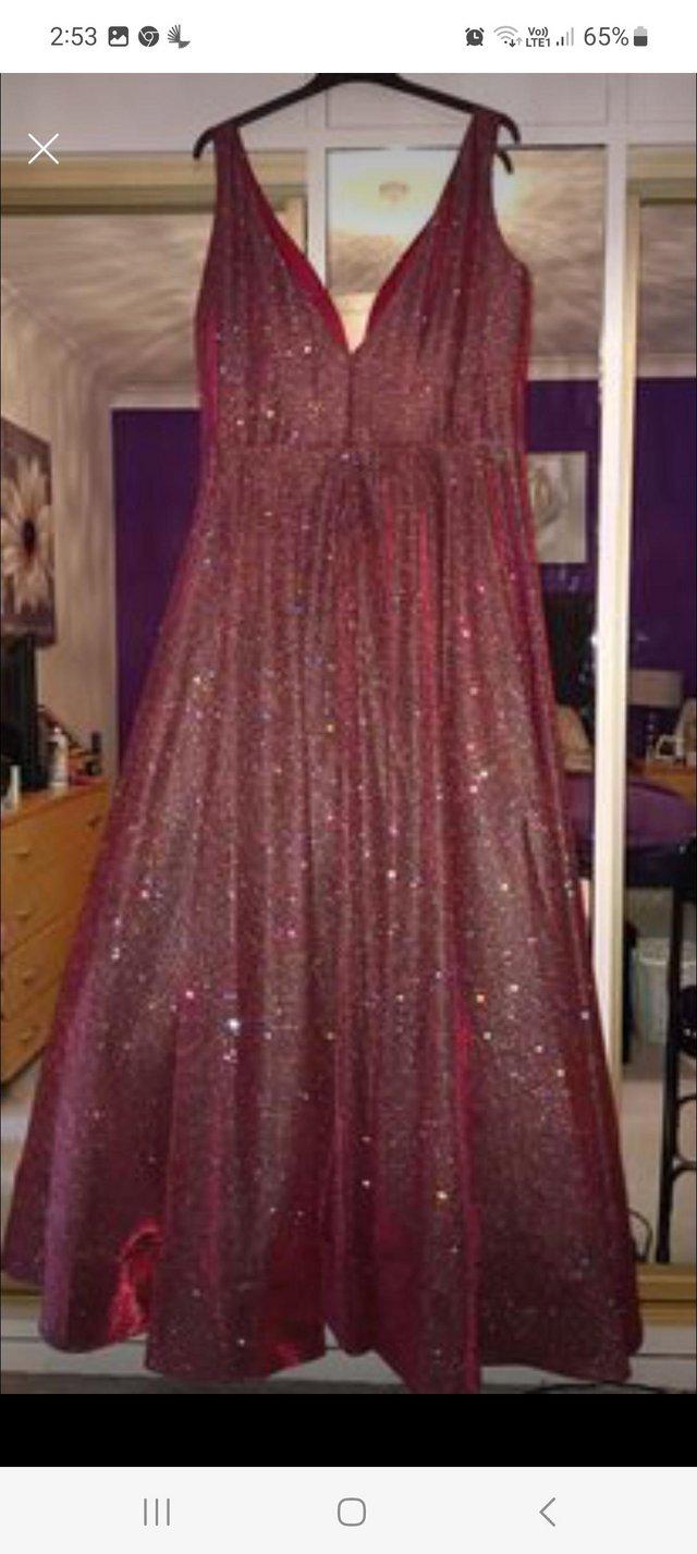 Preview of the first image of Brand new Prom Dress with dress bag.