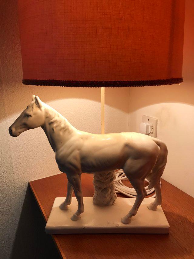 Preview of the first image of Table lamp white horse with orange shade.