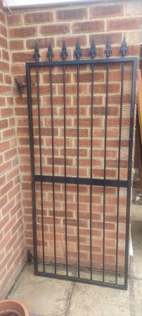 Image 1 of Black wrought iron gate