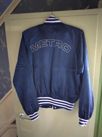 Image 1 of Mini metro, medium jacket. With the Logo