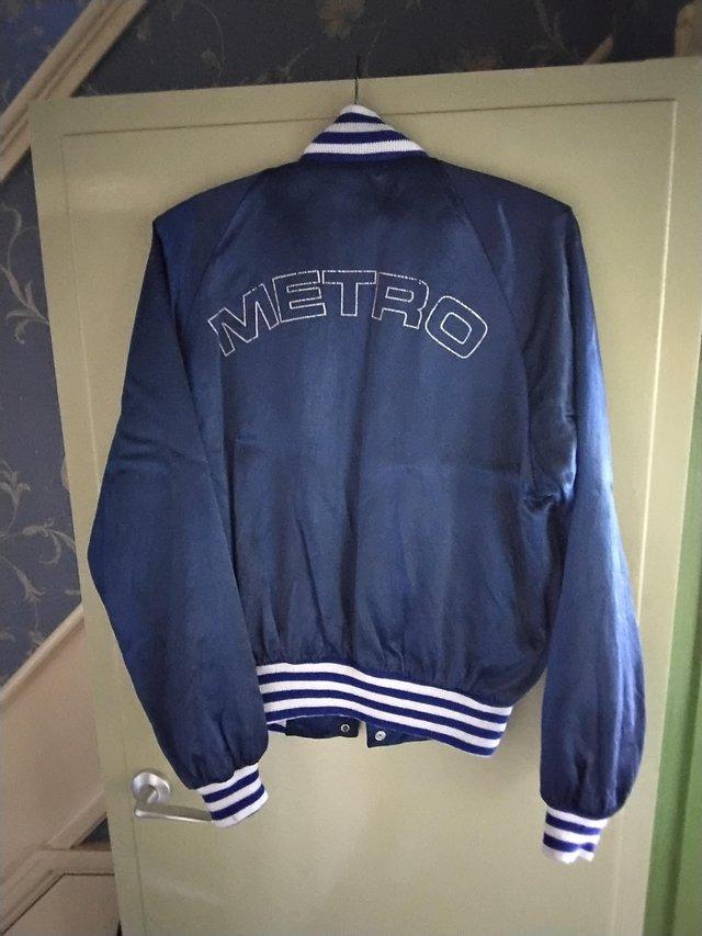 Preview of the first image of Mini metro, medium jacket. With the Logo.