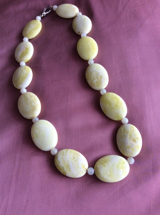 Preview of the first image of Vintage yellow gemstone necklace.