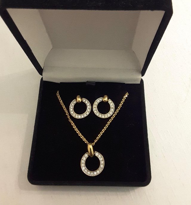 Preview of the first image of Necklace and earring set with diamonté.