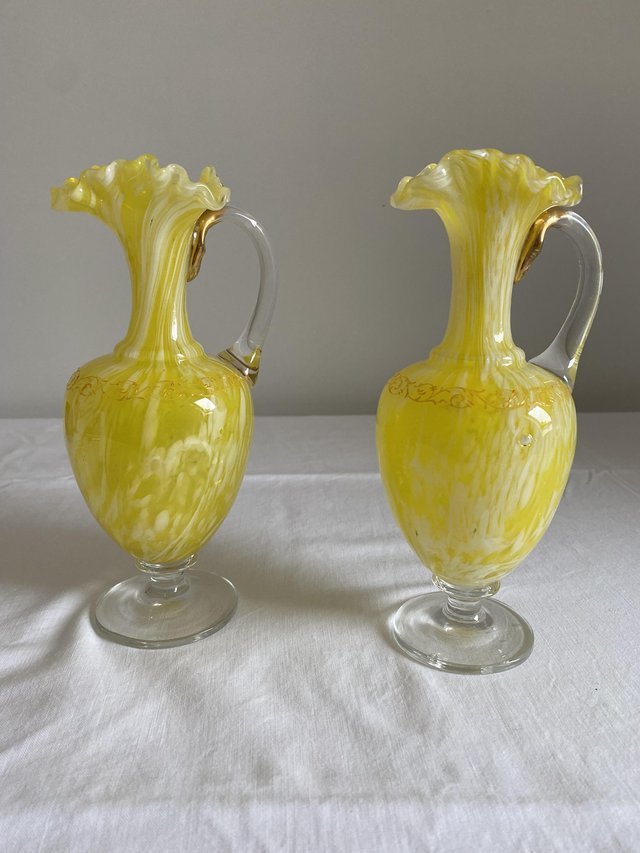 Preview of the first image of Pair of pretty yellow glass vases.