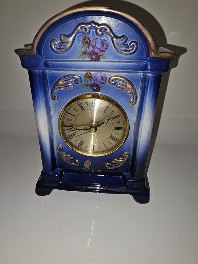 Preview of the first image of Bencraft Of Stoke On Trent Ornate Ceramic Mantel Clock.