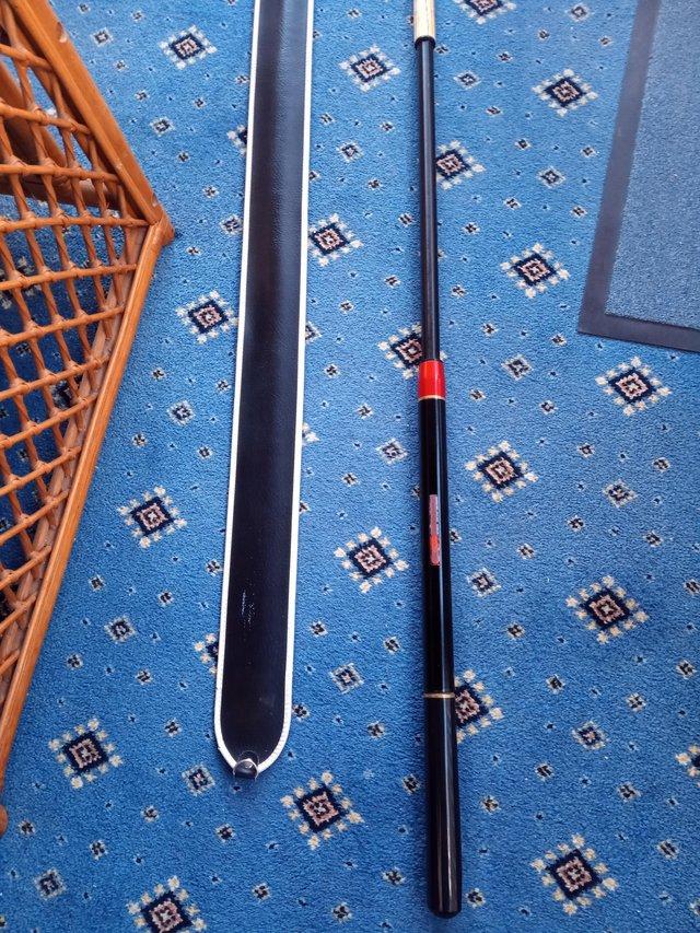 Preview of the first image of Extending snooker cue with case in good condition.
