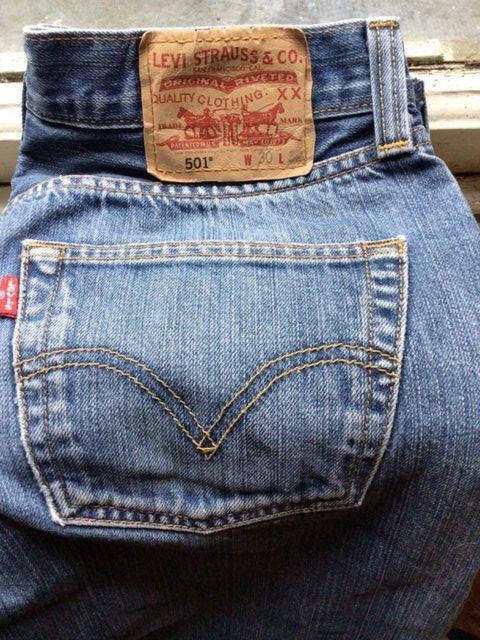 Preview of the first image of Levi Strauss 501 blue denim jeans.