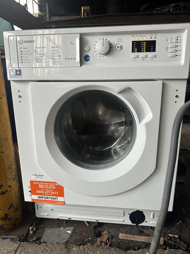 Preview of the first image of Indesit integrated washing machine.