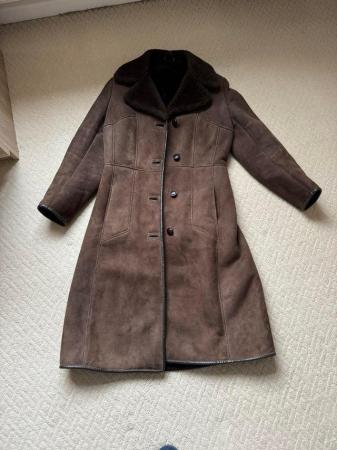 Image 1 of Sheepskin coat size 12 as new.