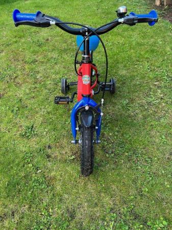 Image 1 of Paw Patrol bike with stabilisers. 12”
