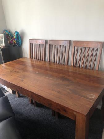 Image 1 of Solid wood dining table and six chairs