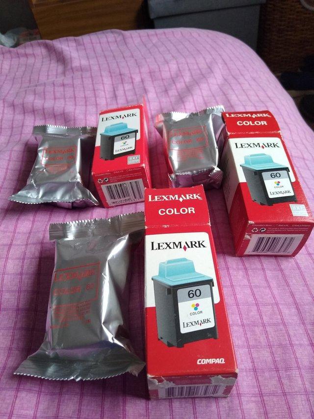 Preview of the first image of Three Lexmark 60 colour printer ink cartridges.