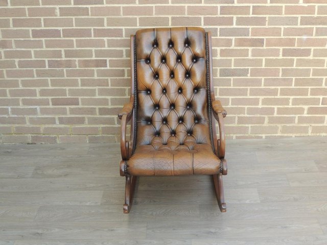 Preview of the first image of Vintage Brown Rocking Chair (UK Delivery).