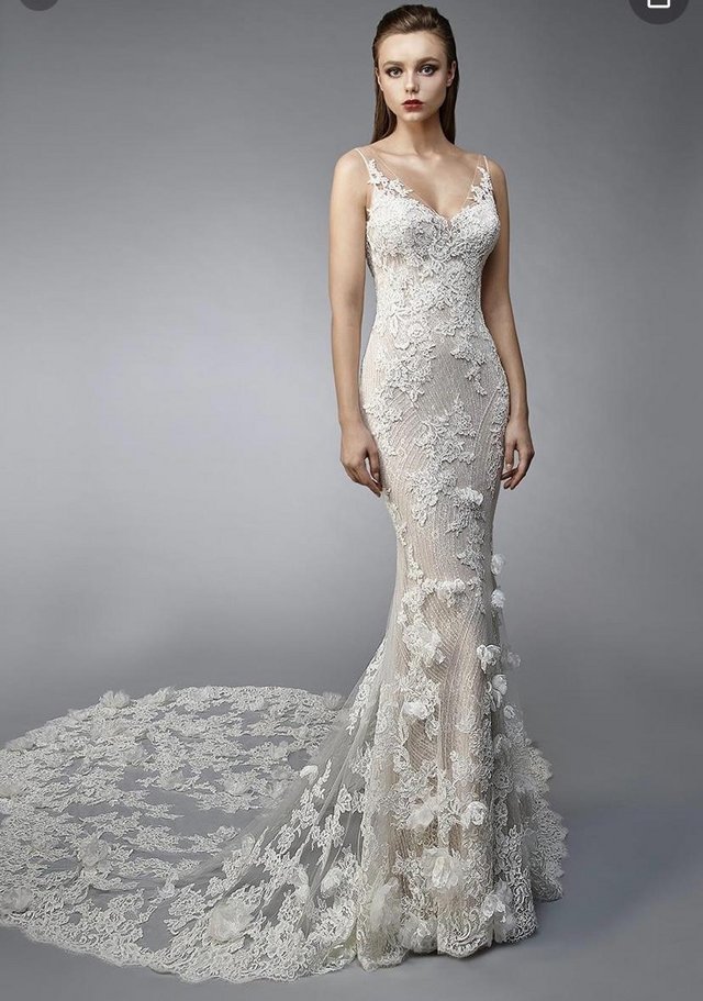 Preview of the first image of Enzoani Nicolette A - Mermaid Double layered wedding dress.