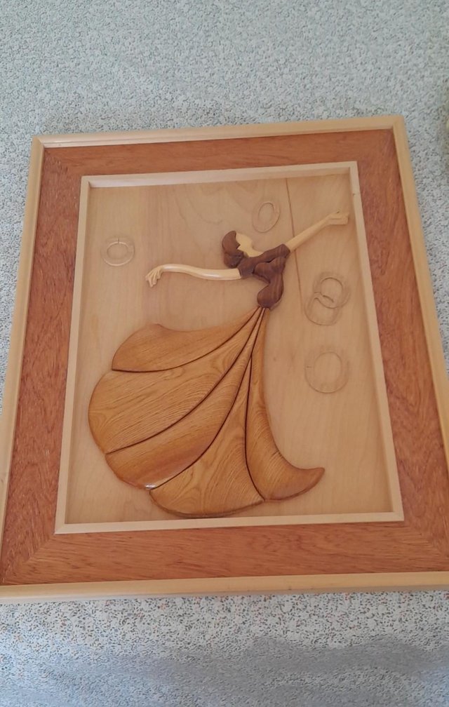 Preview of the first image of Picture of a Dancing Lady, all in wood..