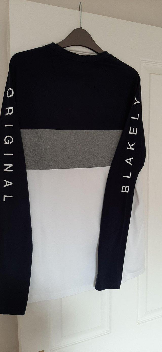 Preview of the first image of Mens long sleeved tshirt.