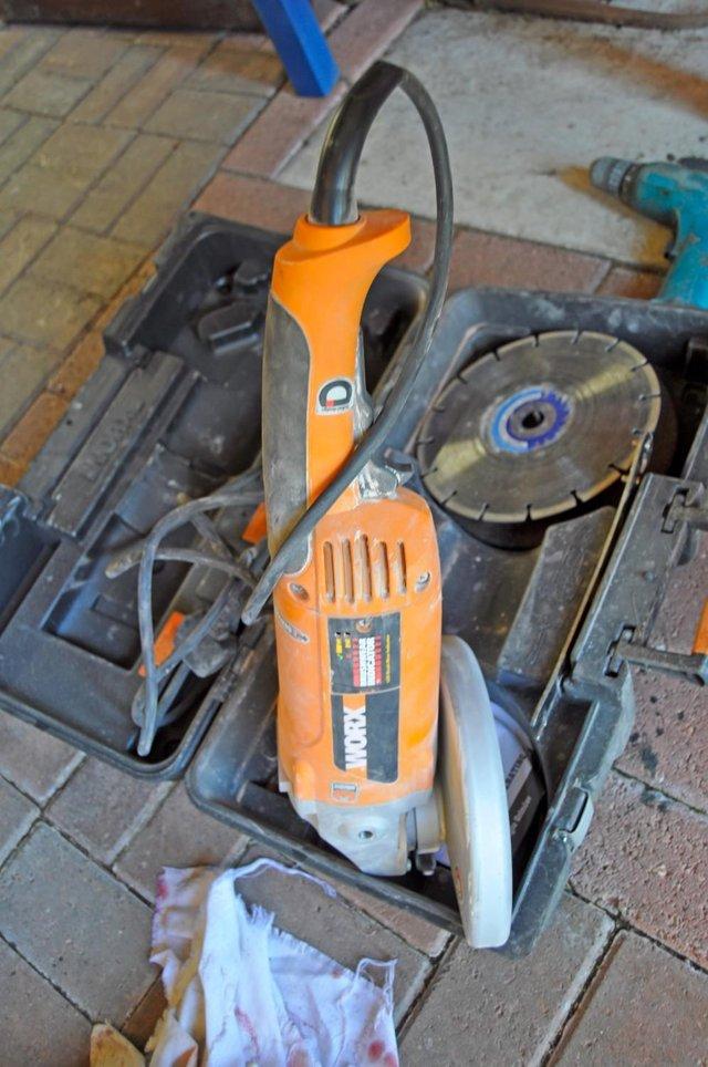 Preview of the first image of Worx 9" angle grinder with box.