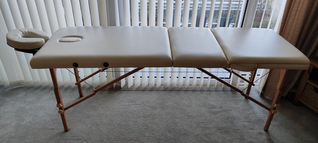 Preview of the first image of Massage table in excellent condition.