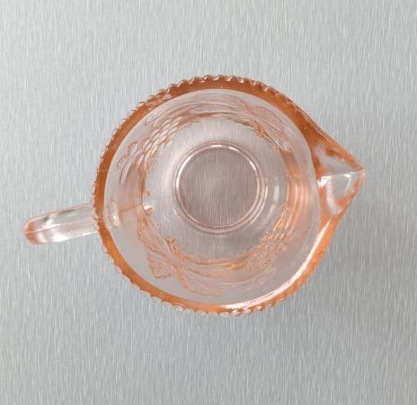 Image 2 of A Small Vintage Glass Jug with Orange Hues.  Height 3.1/2".