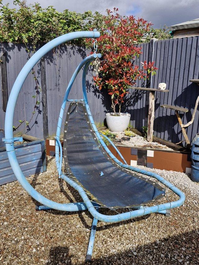 Preview of the first image of Garden swing/hammock . Sturdy metal strong and heavy frame.