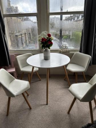 Image 1 of Round white table & four chairs