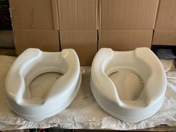 Image 1 of Toilet riser seats times two