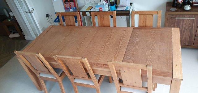 Image 3 of Modern oak 6/8 dining table with 6 chairs and glass top