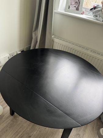 Image 1 of Black 90cm round dining table