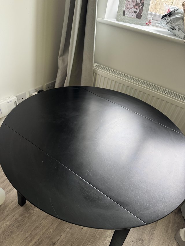 Preview of the first image of Black 90cm round dining table.