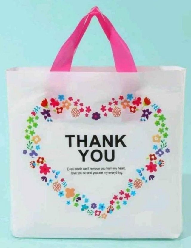 Preview of the first image of 15 thank you gift bags unused.