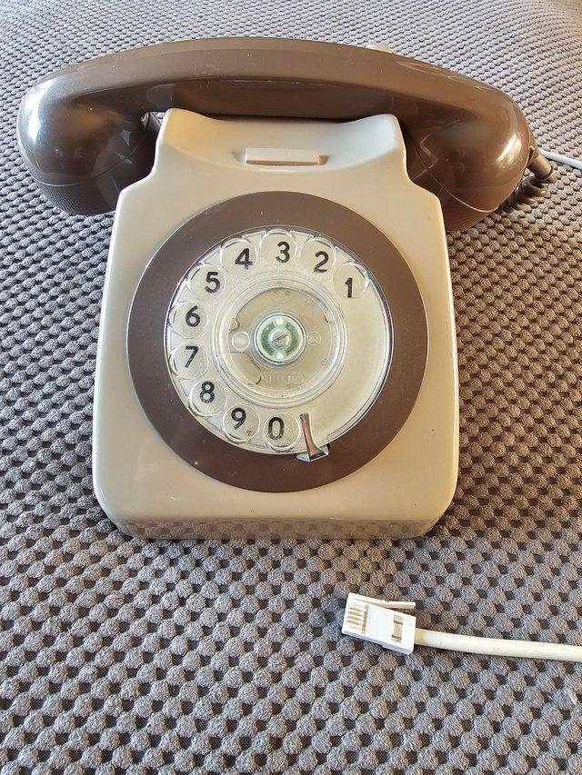 Preview of the first image of Old style manual dial phone good working order.