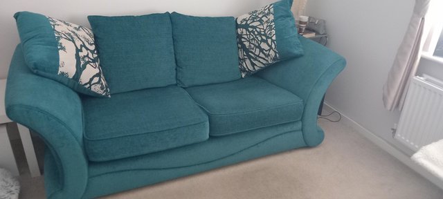 Preview of the first image of Green sofa DFS make.  Washable covers.