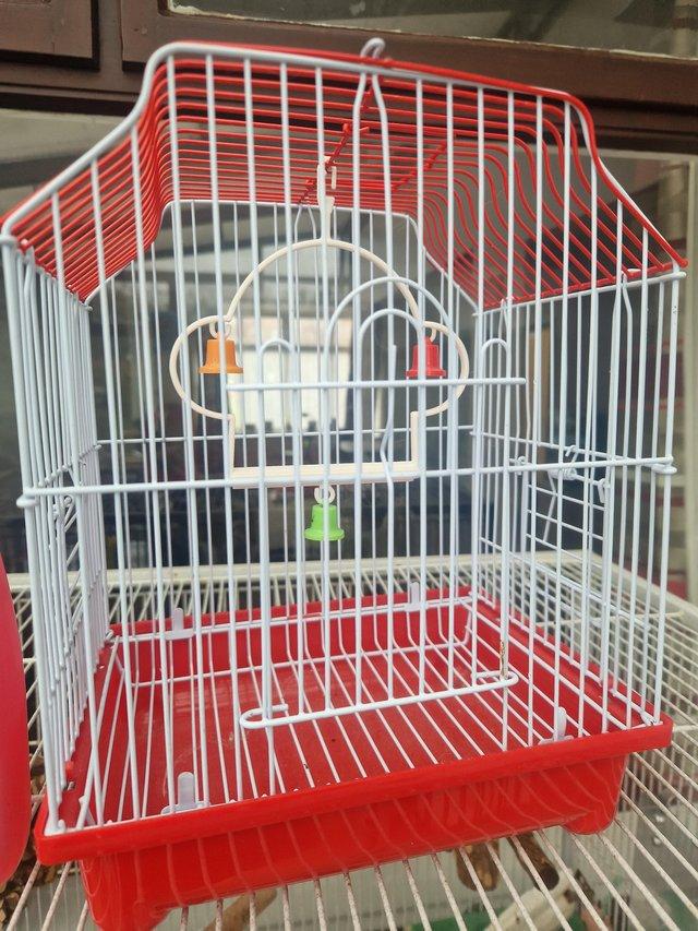 Preview of the first image of Large parrot cage lots toys.