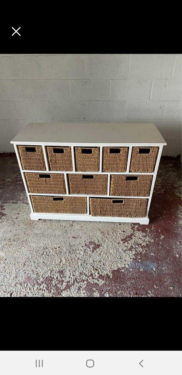 Preview of the first image of White Wicker chest of drawers.
