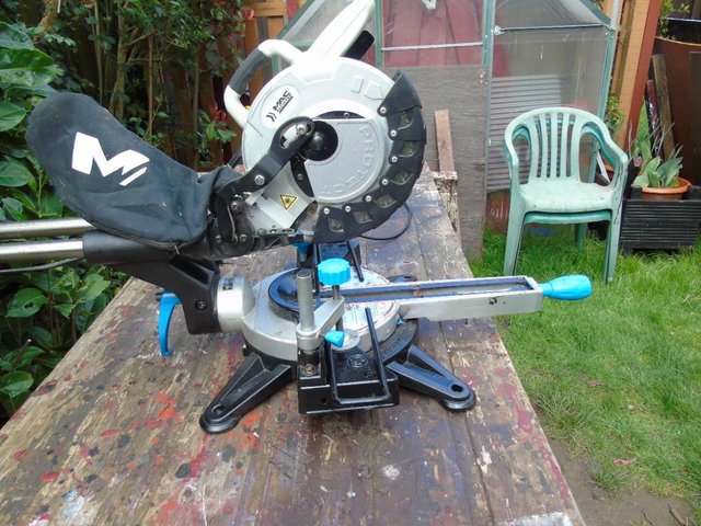 Preview of the first image of macalister sliding mitre saw used.