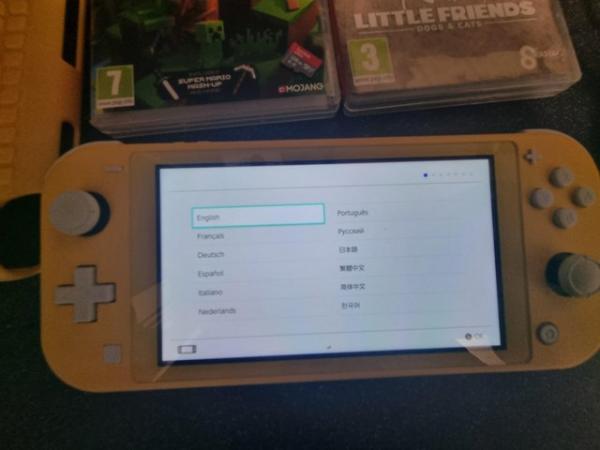 Image 3 of Yellow nintendo switch lite and games