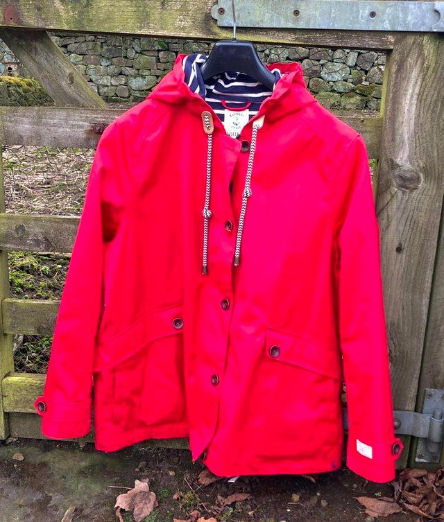 Preview of the first image of Waterproof short coat/jacket by Joules.