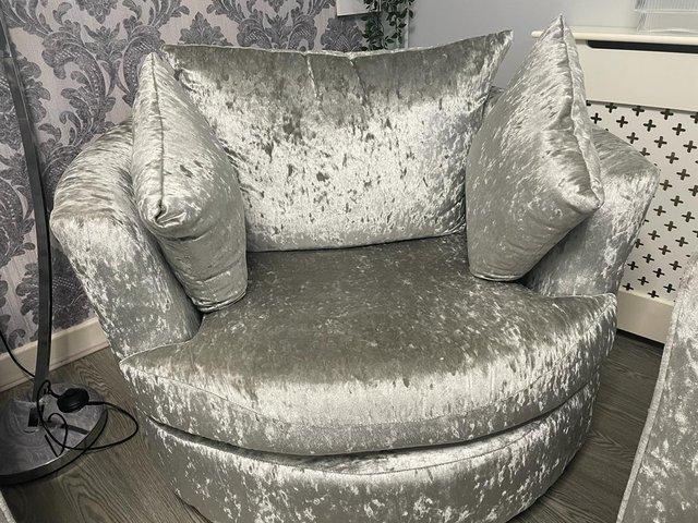Preview of the first image of Crushed velvet sofas in silver Grey.